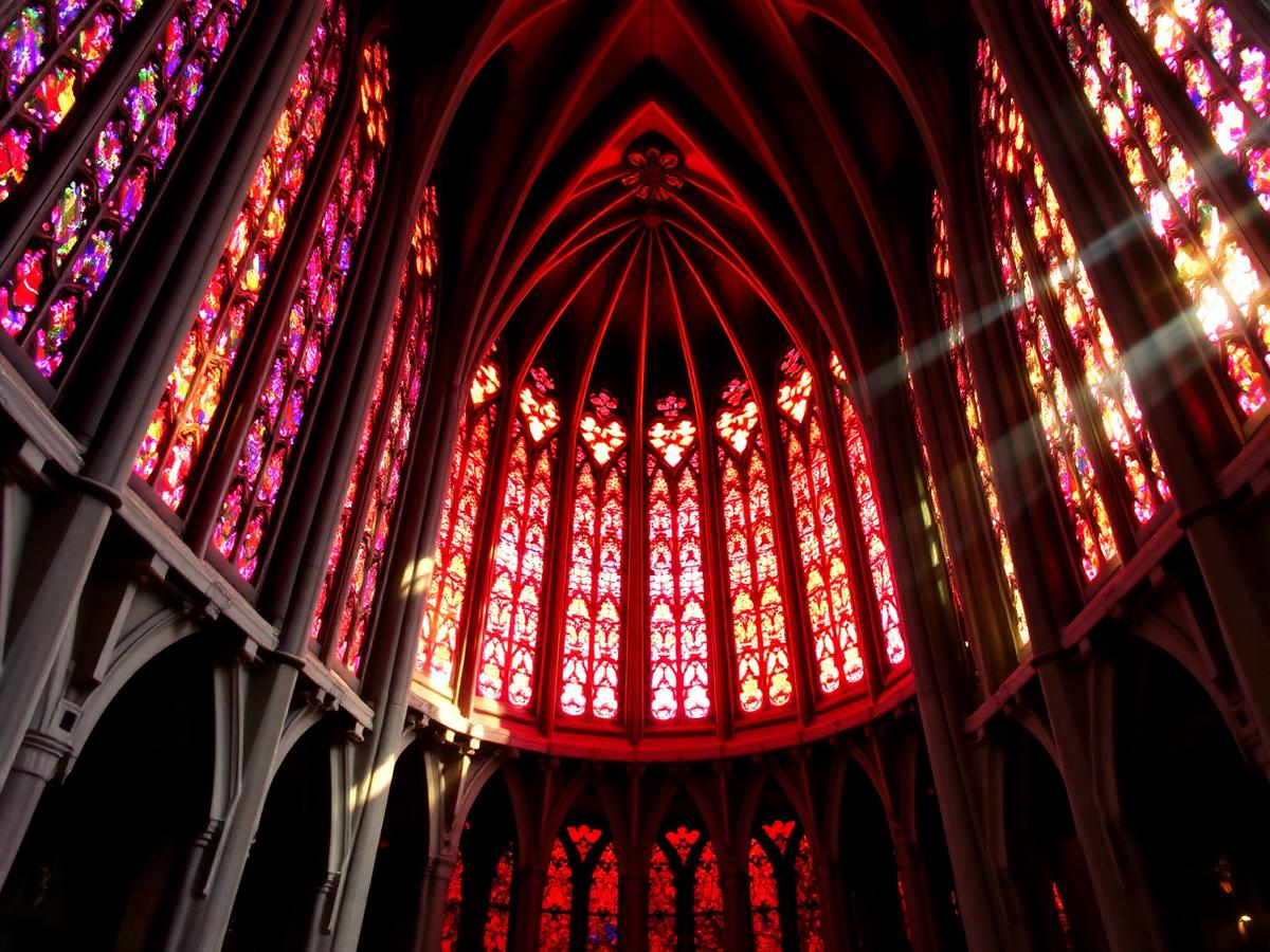 Stained-glass interior in late afternoon light — best time to visit sagrada familia